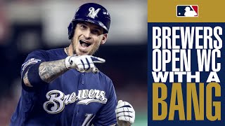 Milwaukee brewers catcher yasmani grandal smacks a huge home run in
the first inning of nl wild card, off arguably best pitcher league,
max...