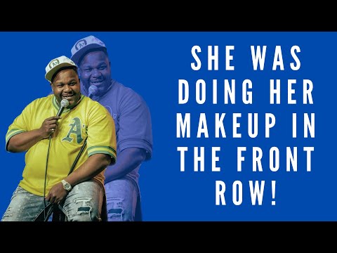 She was doing her makeup in the FRONT ROW!