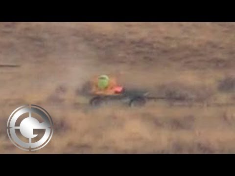 Tough Shot - Mike Shoots a Moving Balloon at 700 Yards!