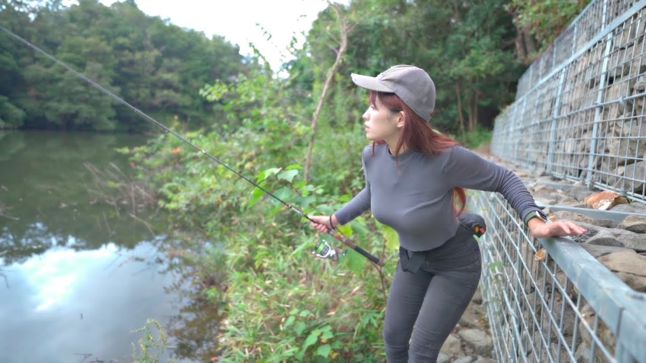 A Woman Catching A Fish In A Second Youtube