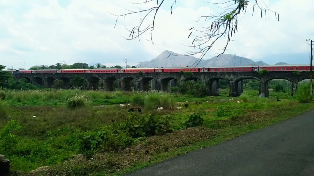 Hisar Coimbatore AC SF express 22475/76 crossing British arc bridge at Palakkad