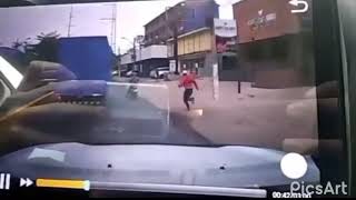 Car Runs Over Robbers Right After They Attack A Woman In The Street Topper