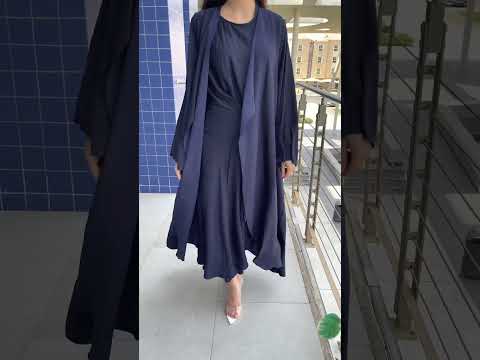 عباية كحلي مع فستان