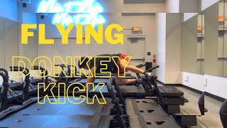 How to Perform a Flying Donkey Kick on the Xformer Pilates Machine