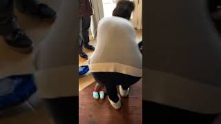 Boy spins on hoverboard then falls off and accidentally hits little girl