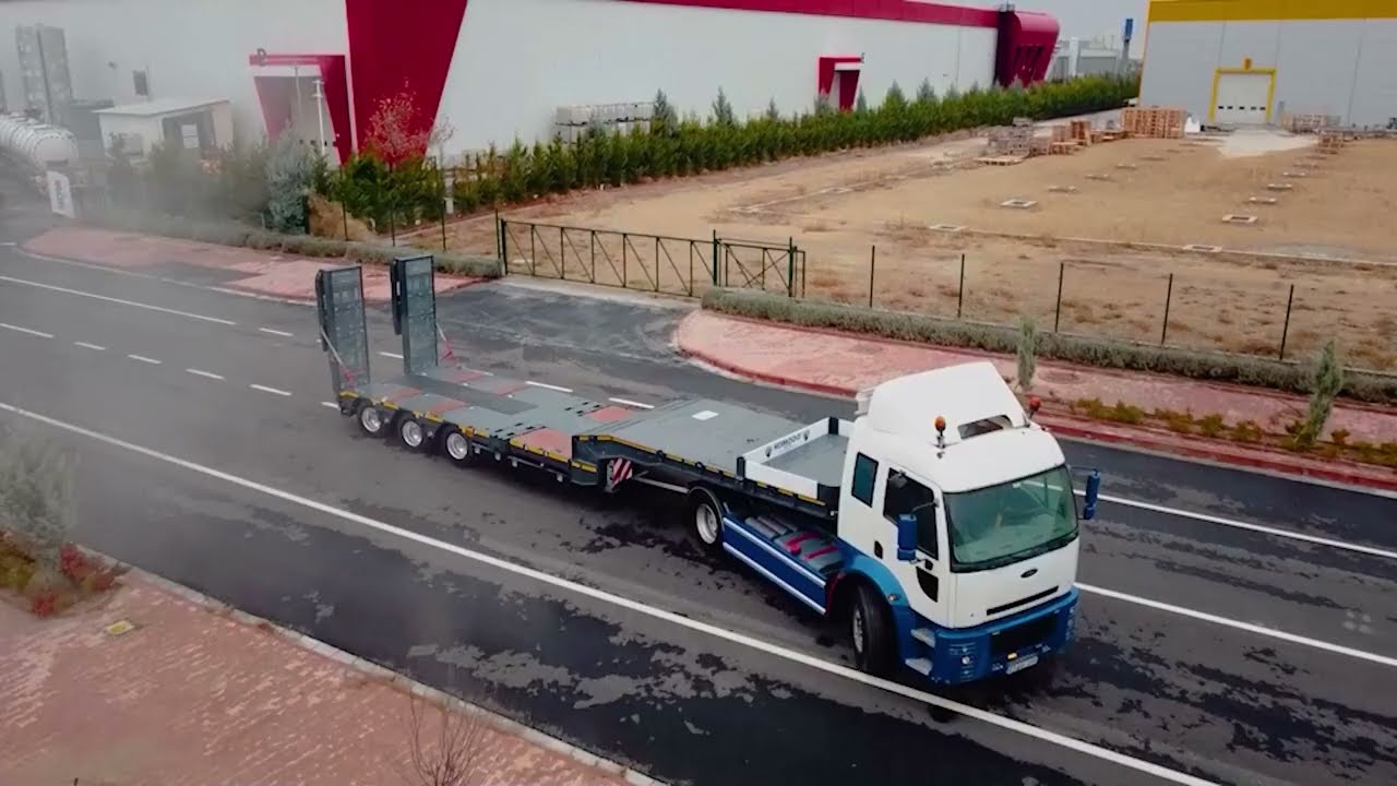 KMD 3 AXLE EXTENDABLE HYDRAULIC STEERING AND HYDRAULIC LIFTING PLATFORM TRAILER