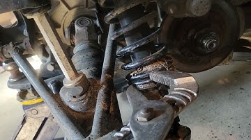 Polaris ATV spring adjustment