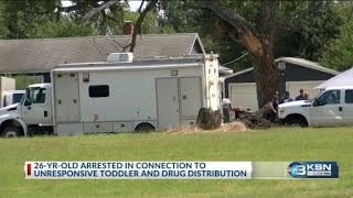 Woman arrested after 2-year-old found unresponsive in south Wichita home