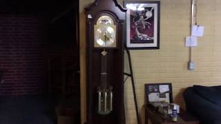Winding a grandfather clock