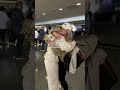 Woman gets surprised by her best friend form australia at the airport for her bachelorette