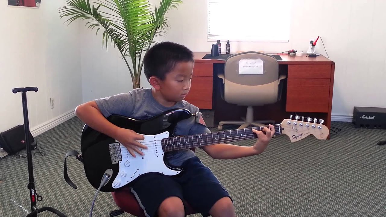 Sandy Guitar student, 8 year old Evan!