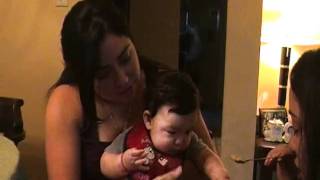 Aiden Eats solids for the first time