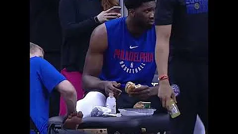 Joel Embiid Is Getting A Foot Massage While Eating A Burger