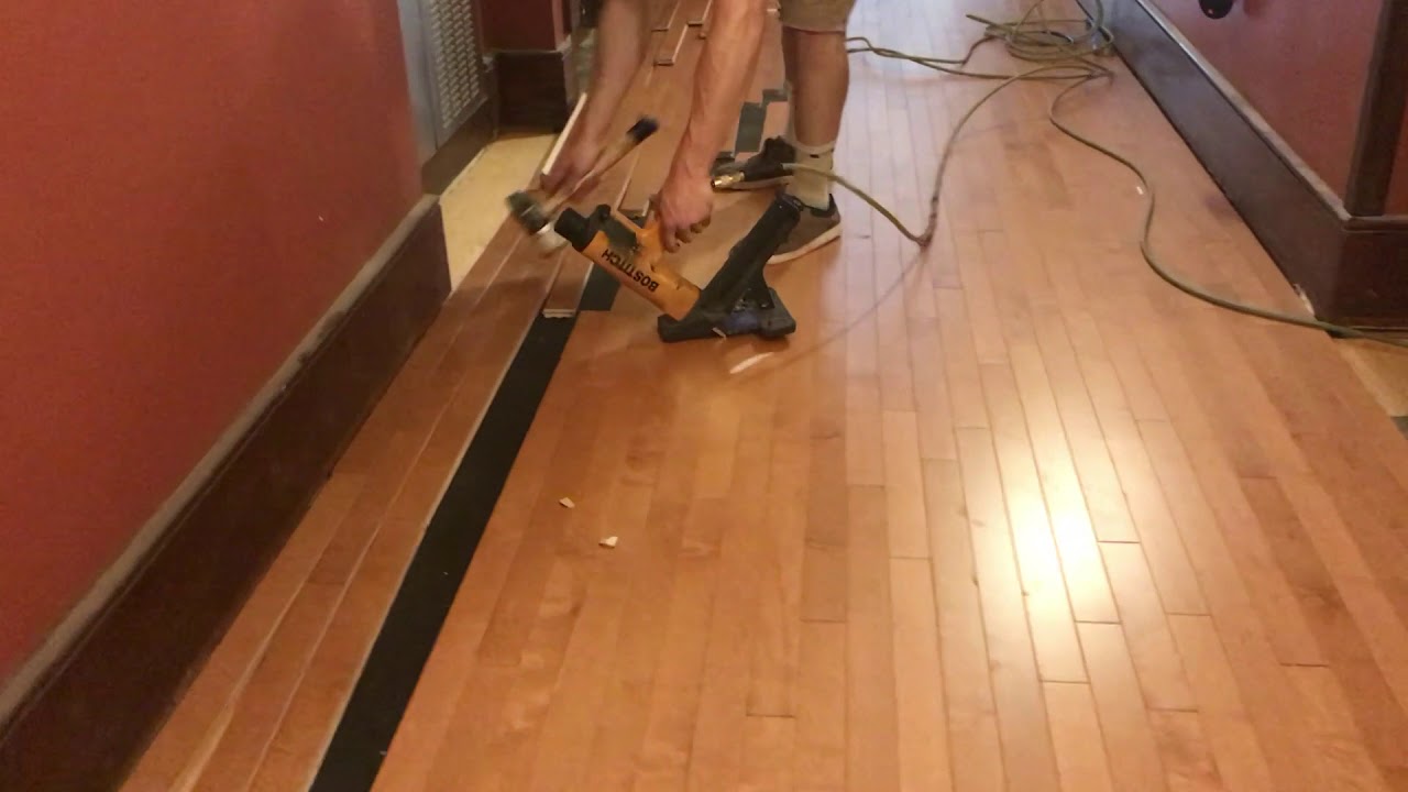 How to install solid hardwood floors. Nail down the project at Princeton University NJ - YouTube