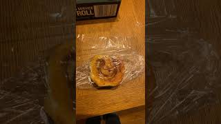 Packaging cinnamon rolls for freezing.