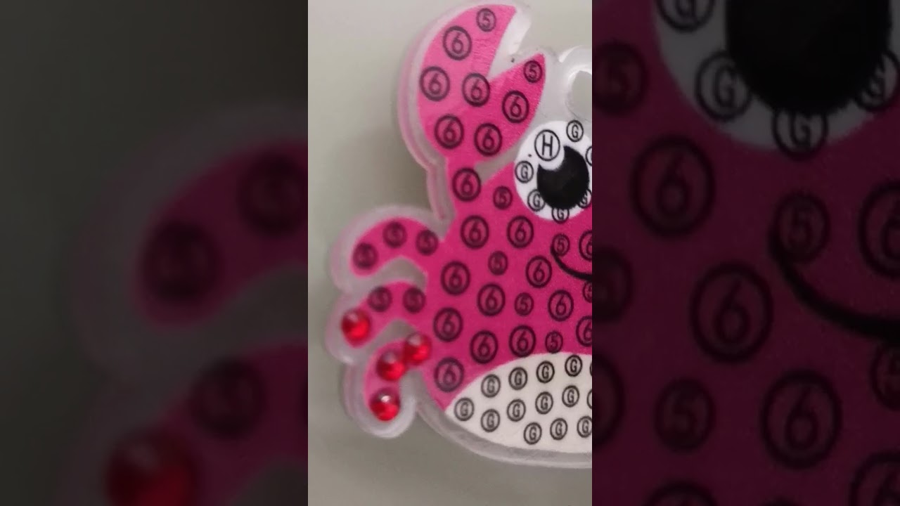 Making gem keychains. 