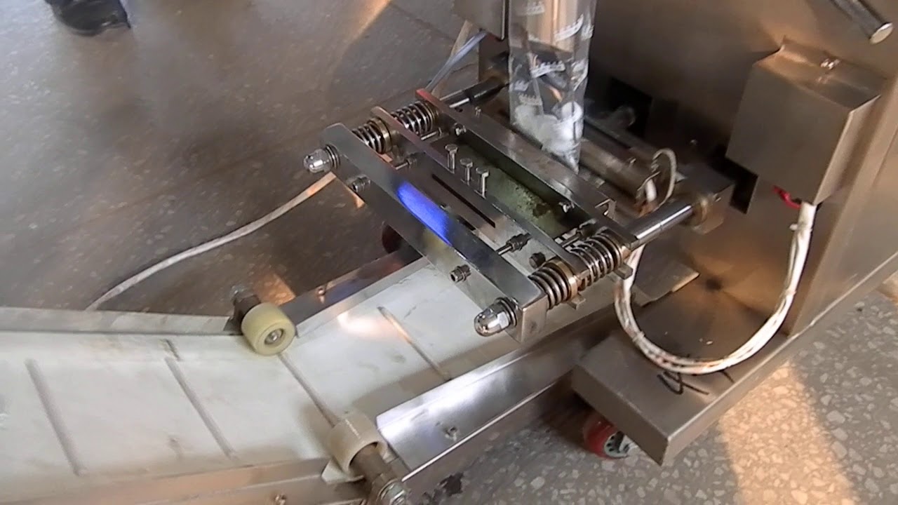 automatic Alcohol cotton ball packing machine - YouTube