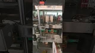 Live video from customer site: Fully automatic double side labeling machine