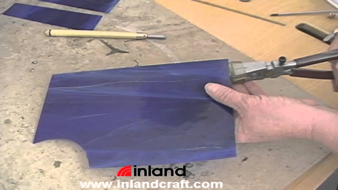 Breaking Out a Score Line on Glass Using a Score Running Pliers 