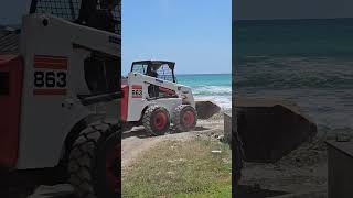 Bobcat 863g Skidsteer working by the beach. #863 #skidsteer #bobcat #skidsteers #barbados #Caribbean