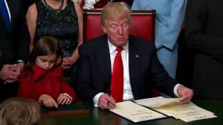 WATCH: FIRST DAY On The Job Donald Trump Signs New Laws