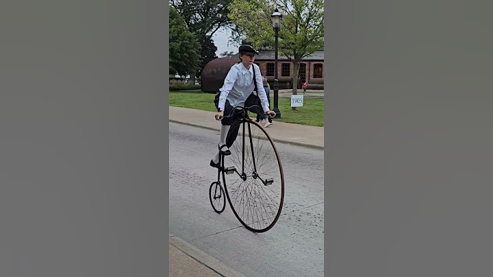 Mounting Penny Farthing Bikes at Old Car Festival Greenfield Village 2023
