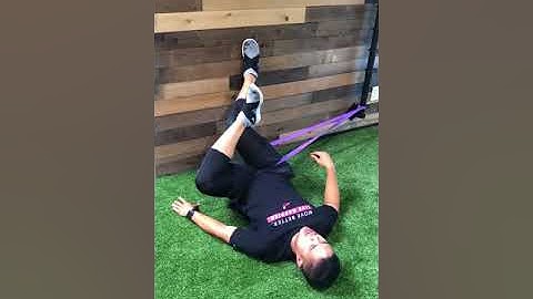 Banded Hip Internal Rotation Mobilization in Supine