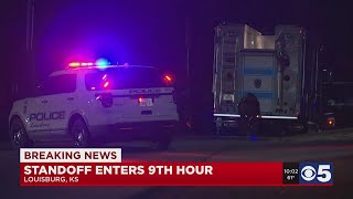 9 hours later Louisburg KS police are on scene of a standoff
