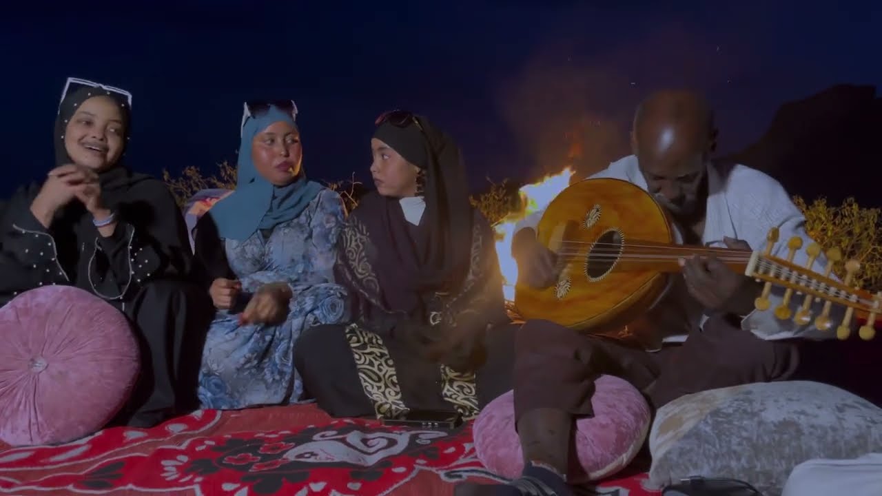 buuraha dhexdooda ayaan qaaci ku tumanay