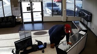 Caught on camera: Clumsy robber drops fake gun, runs away