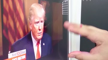 IMU2Face: Real-time Gesture-driven Facial Reenactment