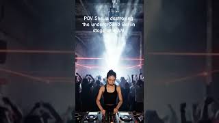 POV inside a dark warehouse techno rave club