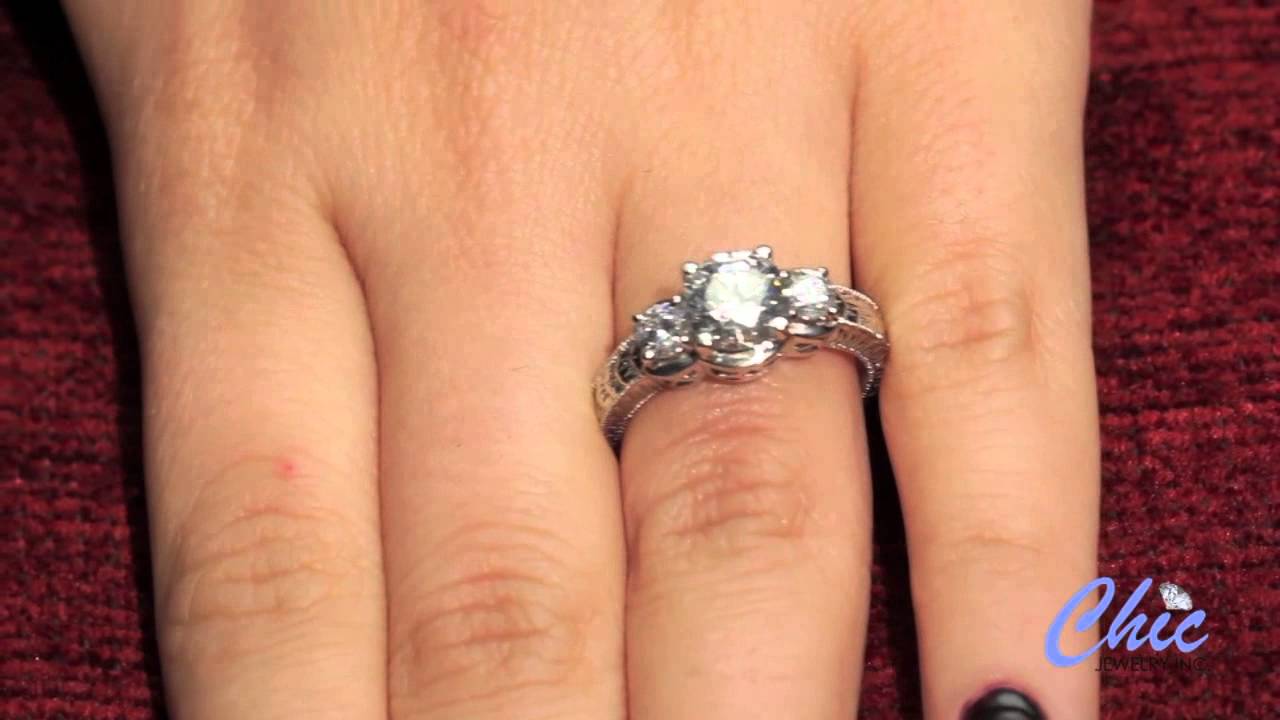 Engraved 3 stone round  cubic zirconia  ring in platinum- item # p5699