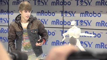 Justin Bieber. A dancing robot. CES 2012.