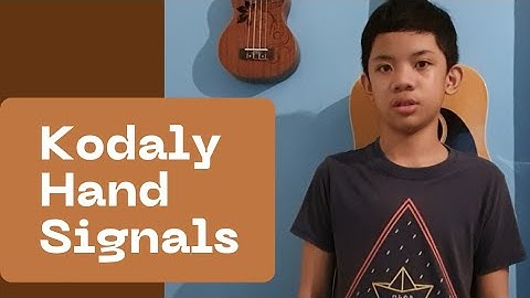 Demonstrating Kodaly Hand Signals while singing the So-fa syllables