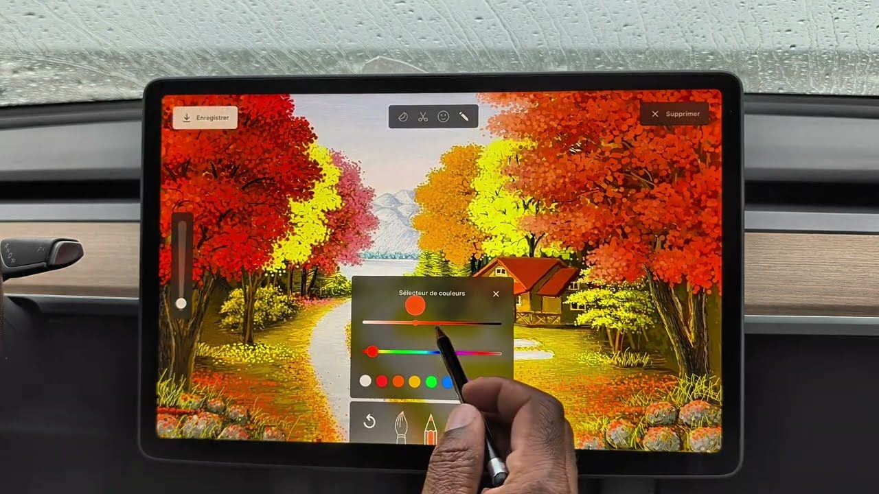 Stunning Canadian fall scene painted on the screen of a Tesla model y.