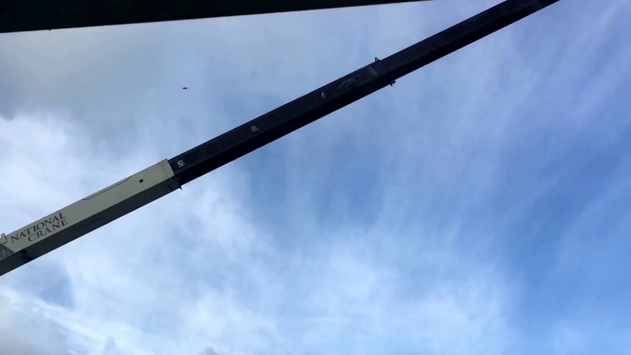 Putting the roof truss on next door Fountain Park, Polk City, Florida