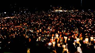 Penn State students sing their Alma Mater during the vigil for victims of Child Abuse