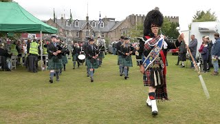 Mace flourish as Drum Major leads Towie Pipe Band on the march into 2023 Aboyne Highland Games