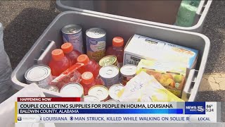 Couple collecting supplies for people in houma, Louisiana