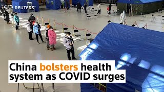 China bolsters health system as COVID surges