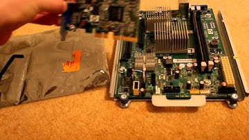 Plugging card into system board.MOV