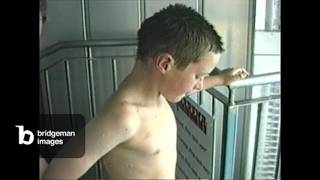 Boy slides down water slide, Salztherme, SaLue, Lueneburg, Lower Saxony, Germany, 01 September 19...