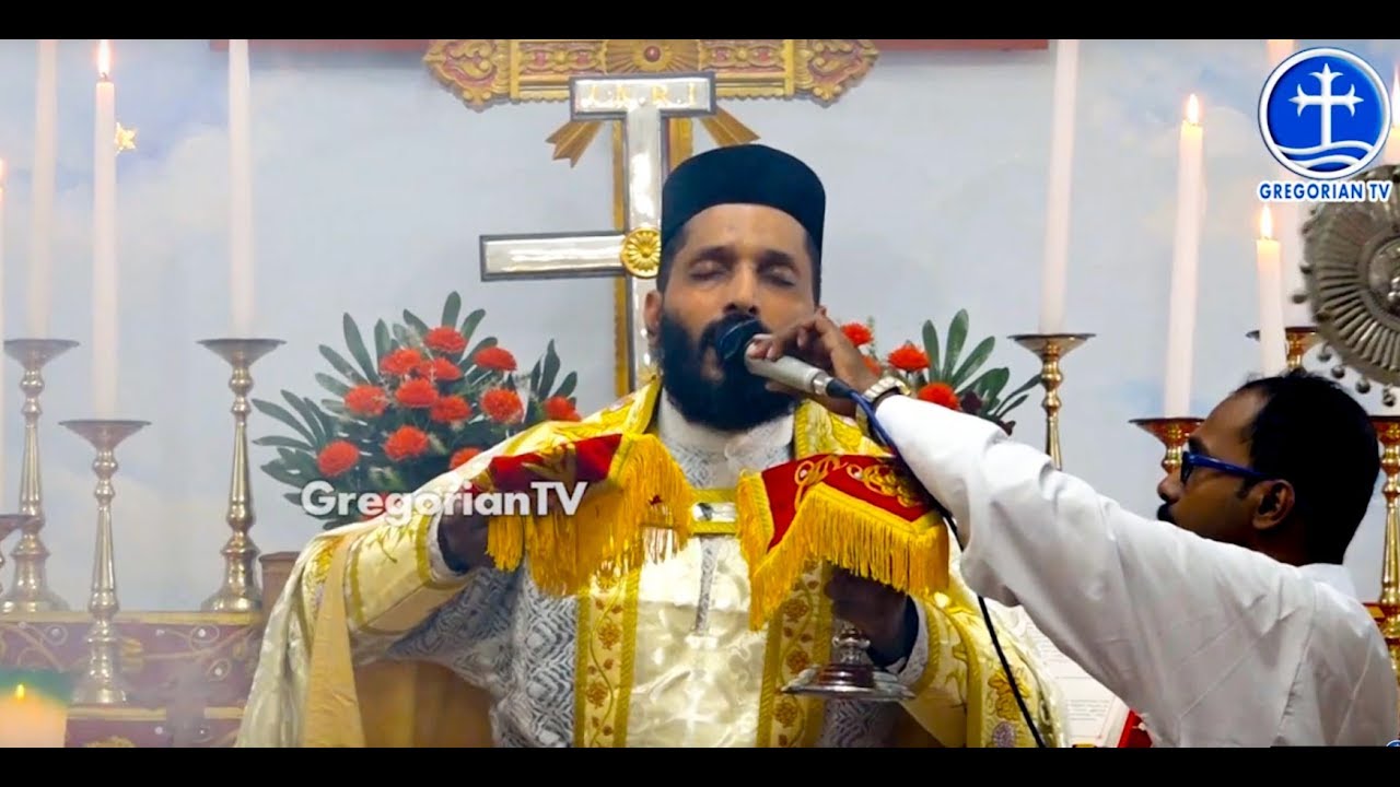 Holy Qurbana- Fr. Alex John - YouTube