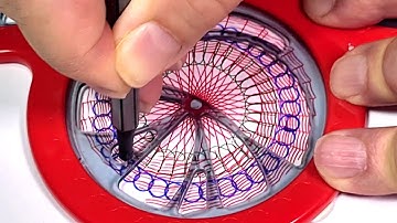 Discover stunning colorful spirographs with hand stencil!" #art #loopart #spirograph
