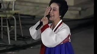 Romaria Internacional "Para vir a xunto" a min" cantado por artistas de Corea del Norte