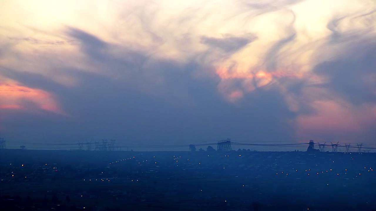 Stock: Sunset over South African township