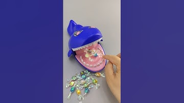 ASMR satisfying opening video, candies, snacks, lollipops, chocolate M&M