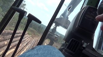 How a John Deere 2154D track loader works