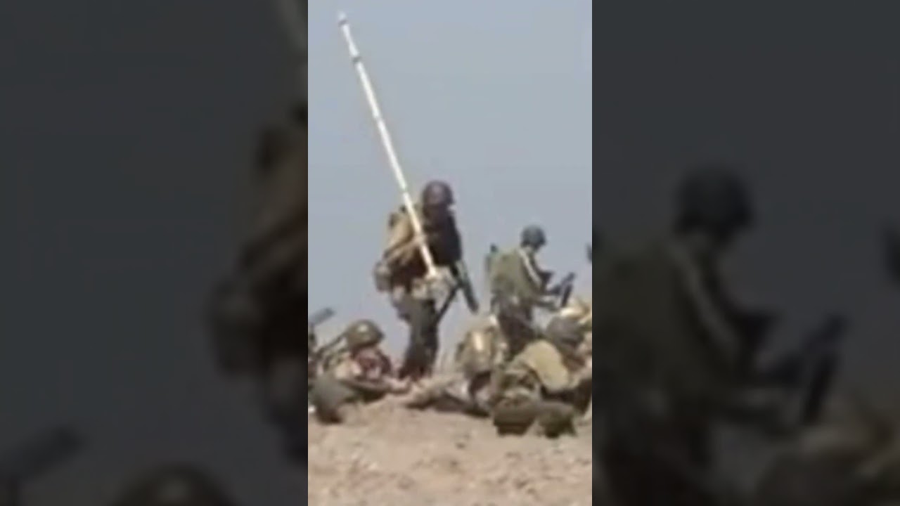 WW D Day American Soldier with Pole Weapon Charges Forward at D-Day Reenactment in Conneaut Ohio